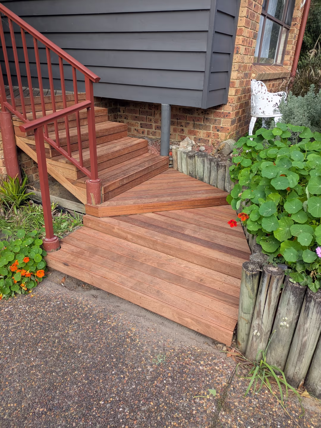 Hardwood entry stairs and landing